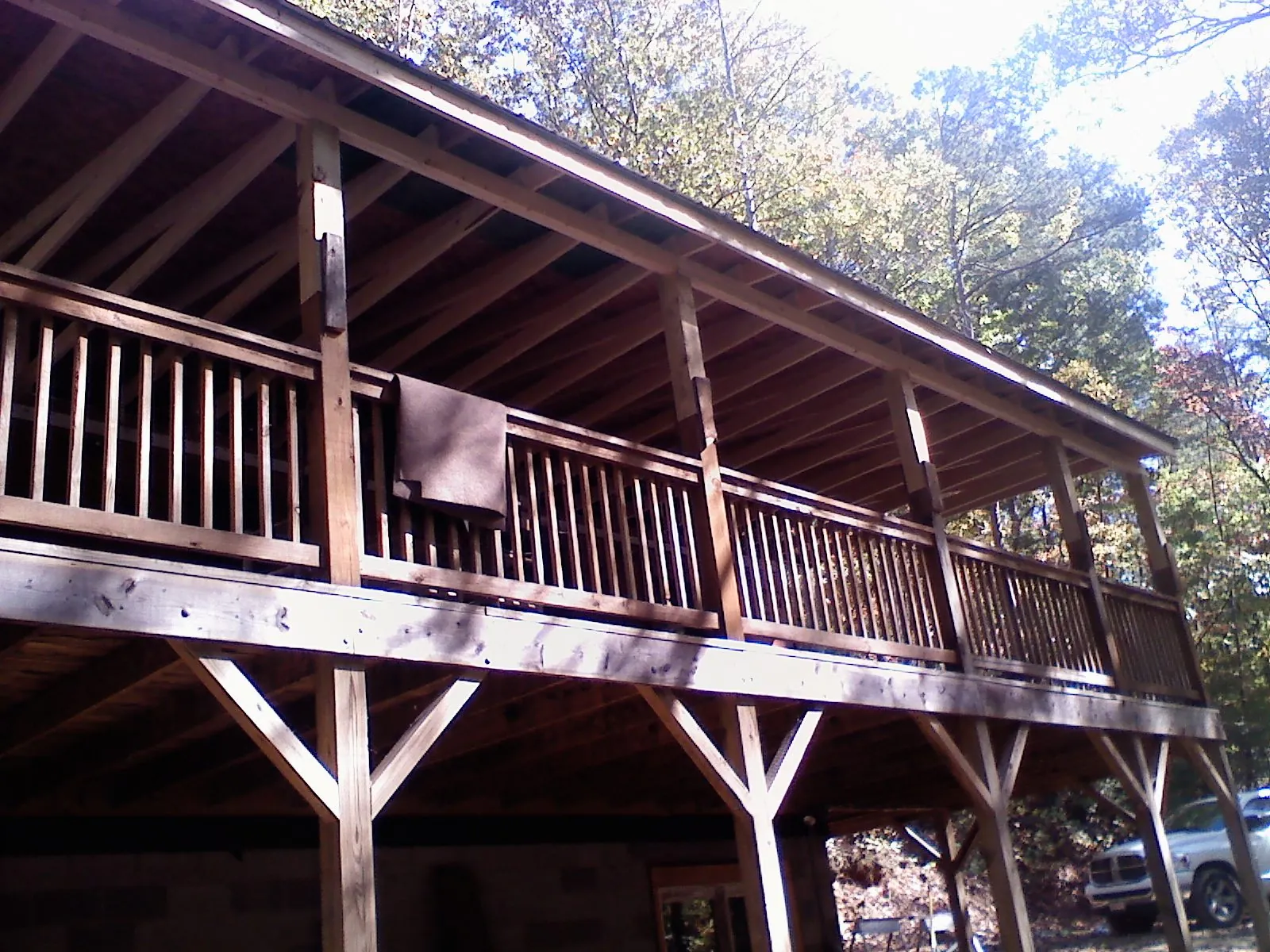 Timber framing under a new elevated porch and deck — Roof Leak Repair in Whitehall by Roofing Brothers